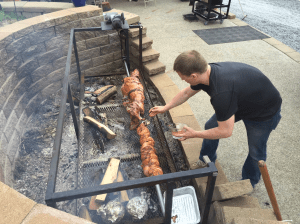 Tyler putting on the BBQ rub.
